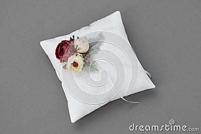 Wedding Pillow for Rings decorated with flowers. Stock Photo