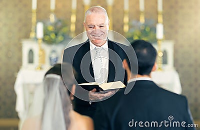 Wedding, priest and couple at the altar saying vows while getting married in a church for commitment, love and care Stock Photo