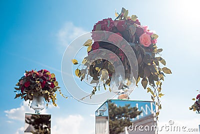 Wedding decor. Wedding registration outdoor. Luxury bouquets with red flowers Stock Photo