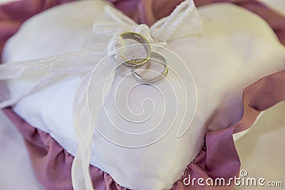 Wedding ring on pillow Stock Photo