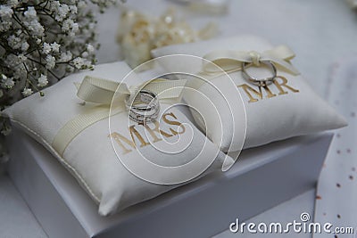 Wedding ring on pillow and nice flowers Editorial Stock Photo