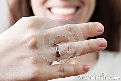 Wedding ring on women finger Stock Photo