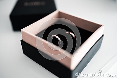 Wedding rings in beautiful box, symbol of love Stock Photo