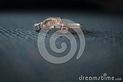 Wedding rings on the blue background Stock Photo