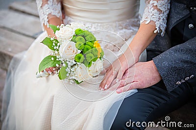 Wedding, rings and bouquet Stock Photo
