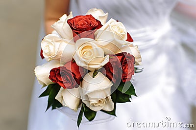 Wedding rings in a box on a background of bouquet of peonies Stock Photo