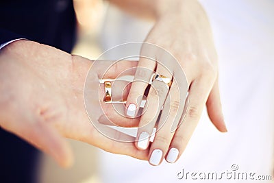 Wedding rings ceremony on the hands Stock Photo