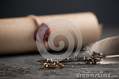 Wedding rings on the figure of a broken heart from a tree, hammer of a judge on a wooden background. Divorce divorce Stock Photo