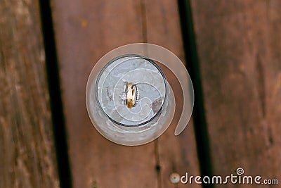 Wedding rings in ice water Stock Photo