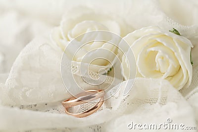 Wedding rings on lace background Stock Photo