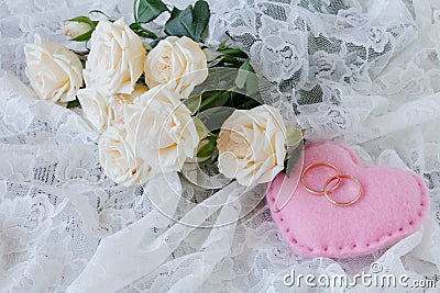 Wedding rings with rose Stock Photo