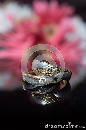 Wedding rings on the table Stock Photo