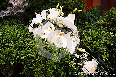 Wedding rings on the wedding bouquet Stock Photo