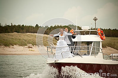 Wedding scene on motorboat Stock Photo