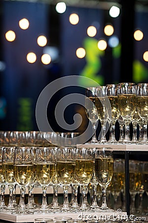 Wedding slide champagne for bride and groom indoors Stock Photo