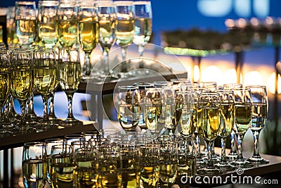 Wedding slide champagne for bride and groom indoors Stock Photo