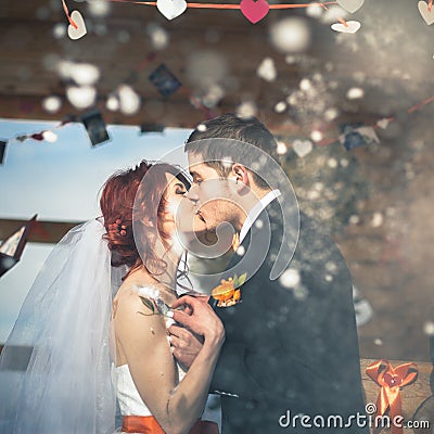 Wedding snowboarders couple just married at mountain winter Stock Photo