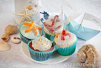 Wedding still life - cupcakes, paper boats and wine Stock Photo