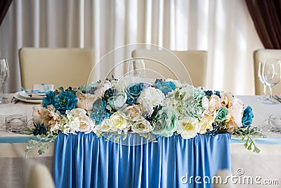 wedding table, the bride and groom table, wedding table decorations, beautifully decorated table in the restaurant Stock Photo