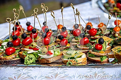 Wedding table with canapes and sandwiches Stock Photo