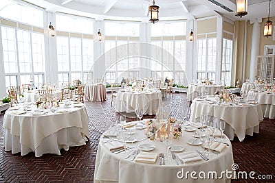 Wedding table decoration series - tables set for beautiful indoor catered luxury wedding event Stock Photo