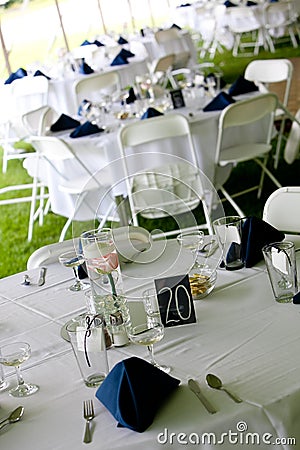 Wedding tables with blue napkins Stock Photo