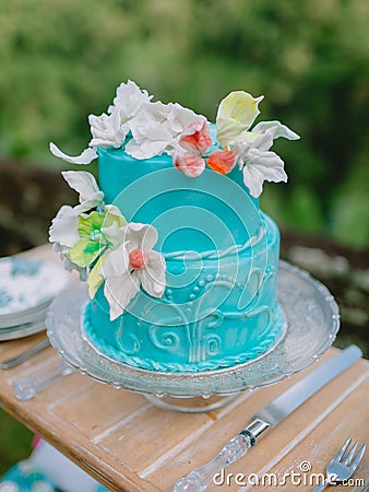 Wedding turquoise cake with sugar flowers. Wedding banquet Stock Photo