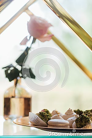 Wedding. Wedding details. Mr and Mrs. Delicious wedding reception candy bar table. Sweet holiday buffet with cupcakes Stock Photo