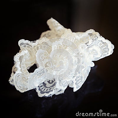 Wedding white garter Stock Photo