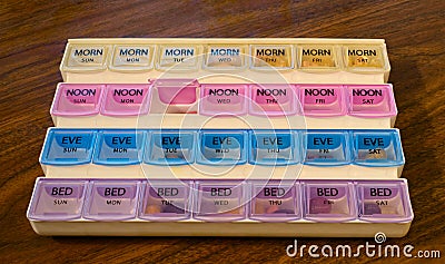 Weekly pill organizer and container Stock Photo