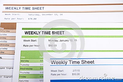 Weekly time sheet forms for payroll Stock Photo