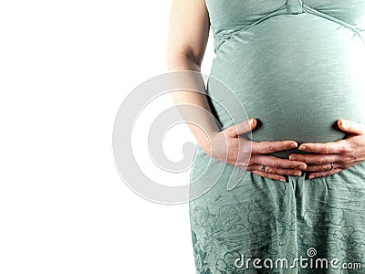 36 weeks pregnant young woman holding her belly Stock Photo