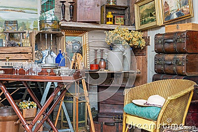 Exposition of vintage furniture at Dutch flea market Editorial Stock Photo
