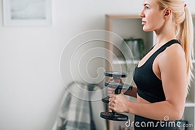 weight fitness motivated woman home training Stock Photo