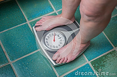 Weight gain Stock Photo