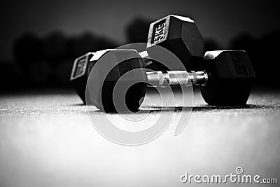 Weight lifting-Dumbells in a crossfit gym Stock Photo