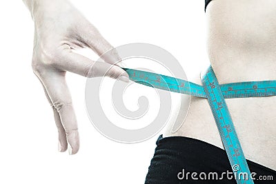 Weight loss. Blue measuring tape on woman body Stock Photo