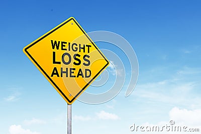 Weight loss road sign over beautiful sky. Stock Photo