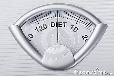 Weight scale indicating diet Stock Photo