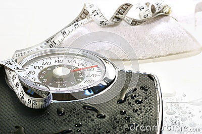 Weight scale and towel Stock Photo