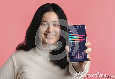 Weightloss Progress App. Plus Size Woman Showing Smartphone Application For Activity Tracking Stock Photo