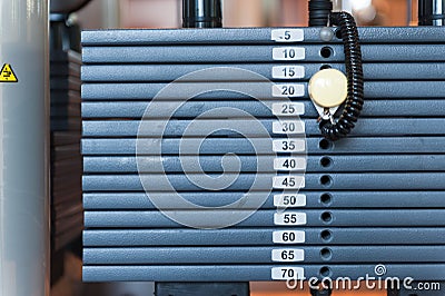 Weights on fitness machine Stock Photo