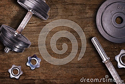 Weights at the gym whit handle and barbell. Stock Photo