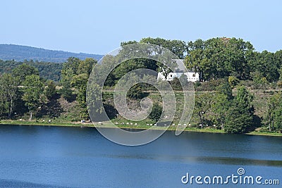 Weinfelder Maar with the goats walking around the shore Stock Photo