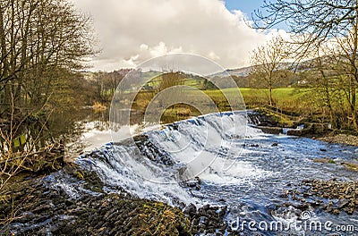 Weir on River Kent, Cumbria, England Stock Photo