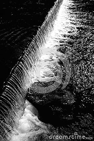 Weir on the River Wye, Bakewell, Derbyshire Peak district, England. Black and white. Stock Photo