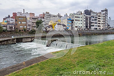 Weir on Saigawa River, Kanazawa, Japan Stock Photo