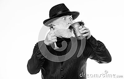 Weird old grandfather with gray beard and spider. Preparing magic Halloween drink. Halloween concept. Strange people Stock Photo