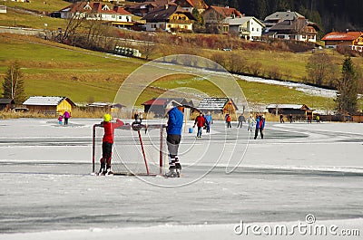 Weissensee in winter: hockey and ice skating Editorial Stock Photo