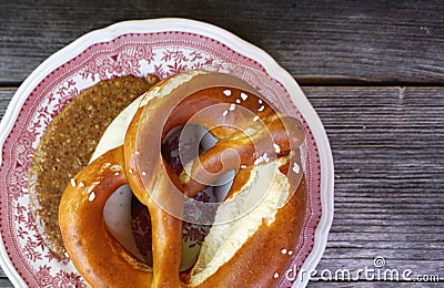 Weisswurst with homemade Pretzel Stock Photo